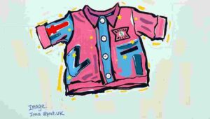 A baby dressed in expensive Burberry clothing, exemplifying London's designer baby fashion trend.