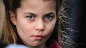 Princess Charlotte looking thoughtful during an engagement Princess Charlotte displaying a thoughtful, observant expression at a royal engagement.
